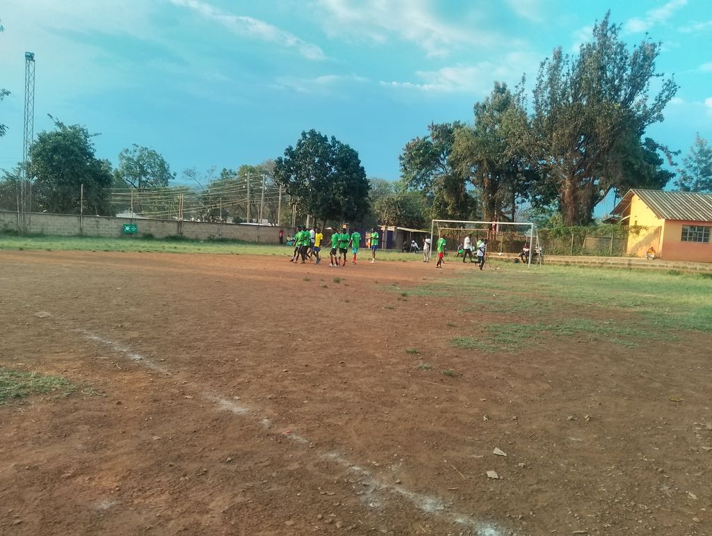 Players in green jerseys on the pitch during a match at the Inter-Masjid Football Tournament in Kisumu.